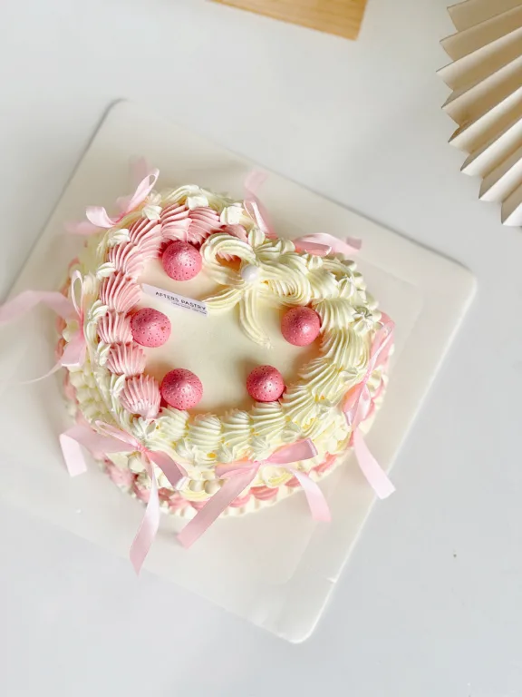 Vintage Hearty Cake with pink piping and romantic heart shape