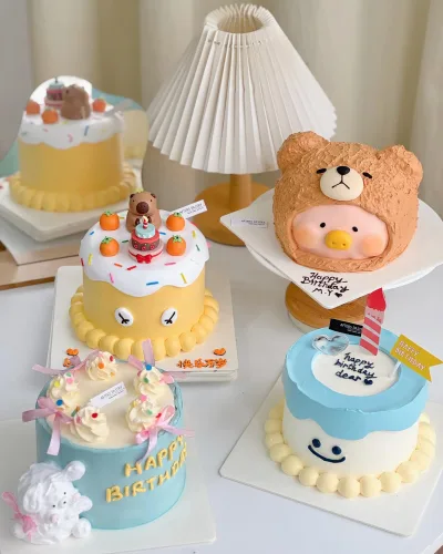 Korean minimalist cake with pastel colors and piped text