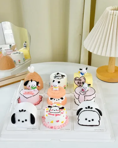 Set of six mini cakes in various flavours with decorative toppings