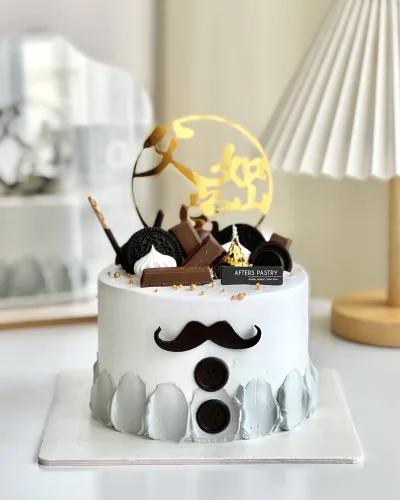 Customized Father’s Day Chocolate Cake with gold decorations and custom message