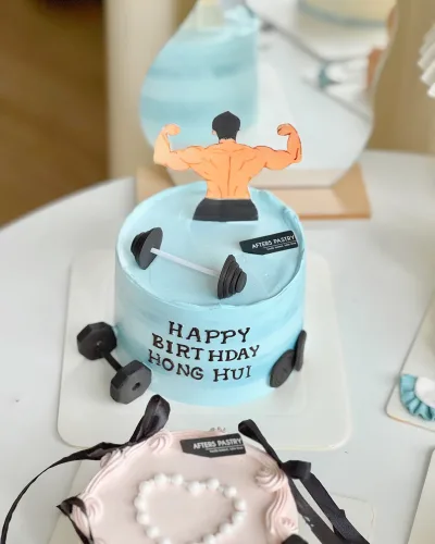 Custom Muscle Man cake with six-pack fondant design