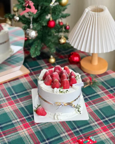 Strawberry Christmas Cake with layered sponge flavours and fresh strawberry topping