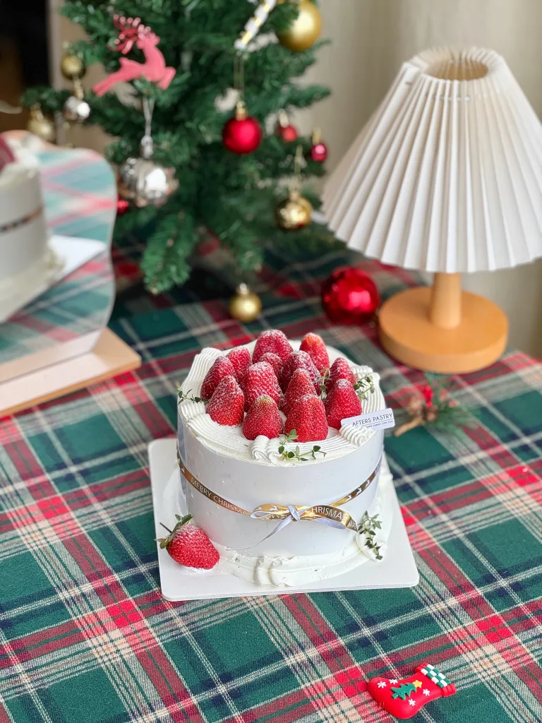 Strawberry Christmas Cake with layered sponge flavours and fresh strawberry topping