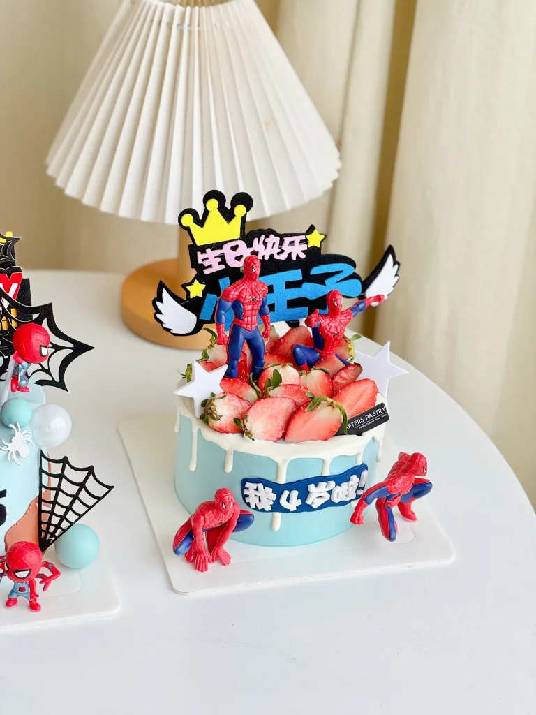 Marvel’s Spider-Man Cake with red strawberry and superhero design | Afters Pastry