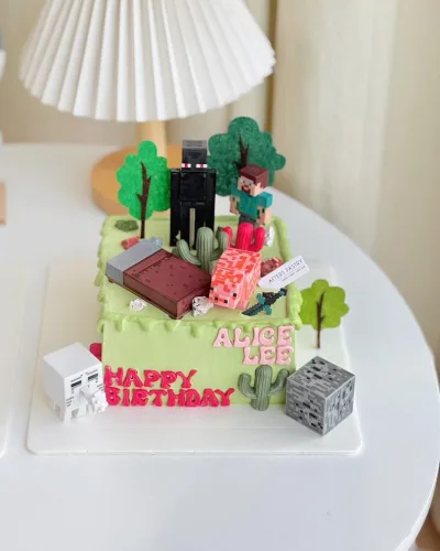 This Minecraft Adventure Birthday Cake from Afters Pastry showcases a miniature Minecraft world with characters, terrain, and pixel-style details, making it perfect for kids’ gaming birthdays and themed celebrations.